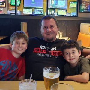 Mike Enjoying Bbq With Sons